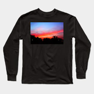 Stunning red purple sunset over a coastal town Long Sleeve T-Shirt